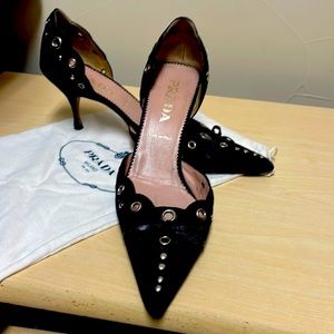 Black shade with silver studs, some see through.